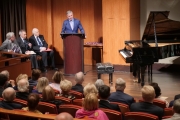 066 Ron Losby, president and CEO of Steinway & Sons officially greeting members of the NYIPC and their families